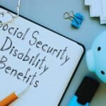 Social Security Disability Benefits written in a notebook